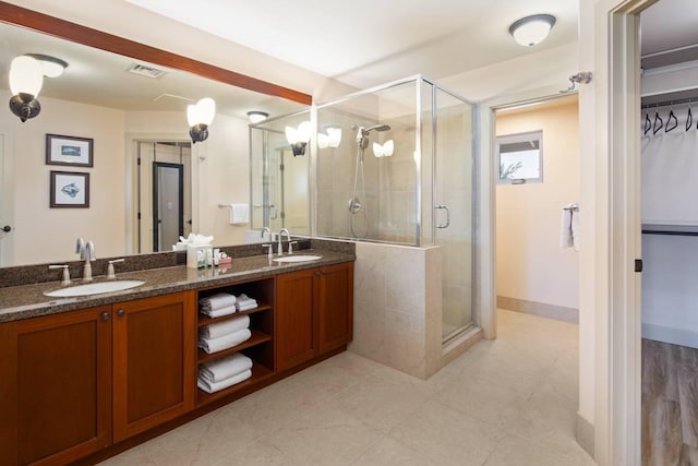 bathroom featuring vanity and walk in shower