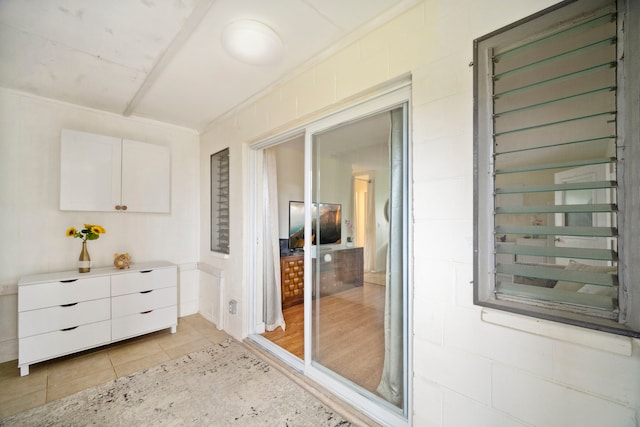 interior space featuring light tile patterned floors