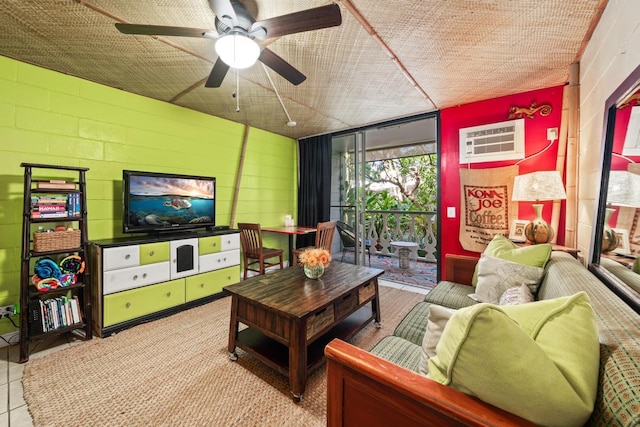 living room featuring ceiling fan and a wall mounted AC