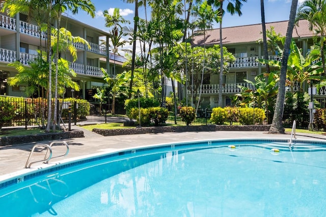 community pool with fence