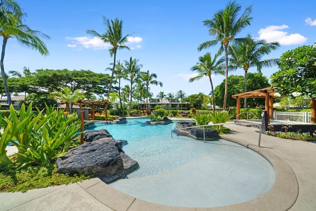 community pool with a gazebo