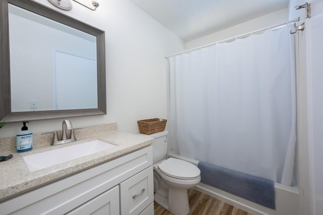 full bathroom with shower / bath combination with curtain, vanity, toilet, and wood finished floors