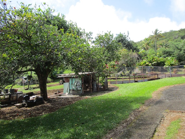 view of yard with fence