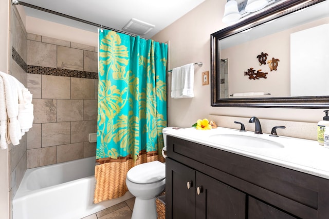 full bath featuring shower / bath combination with curtain, tile patterned flooring, vanity, and toilet