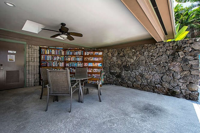 unfurnished dining area with ceiling fan and visible vents