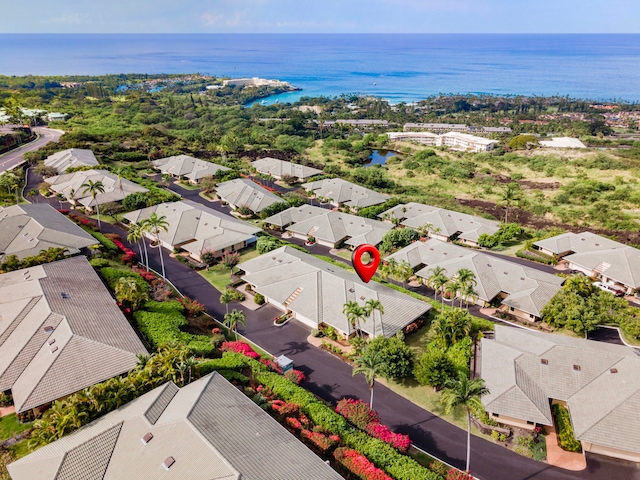 bird's eye view featuring a water view and a residential view