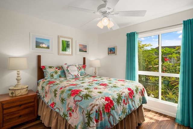 bedroom featuring wood finished floors and a ceiling fan