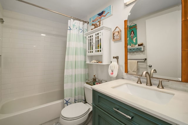 full bathroom with tasteful backsplash, shower / bath combo, vanity, and toilet