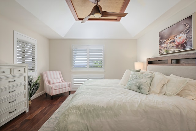 bedroom with a ceiling fan, multiple windows, dark wood finished floors, and baseboards