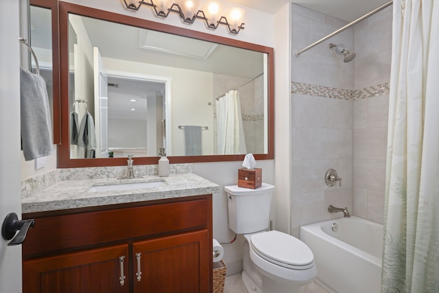 bathroom featuring toilet, shower / bath combo, and vanity