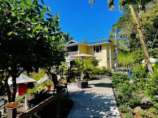 view of home's community with a patio