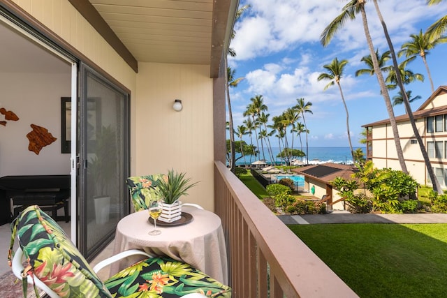 balcony featuring a water view