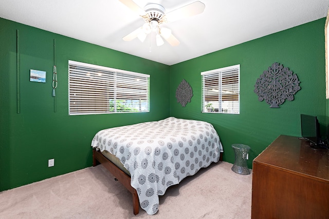 bedroom with carpet floors and ceiling fan