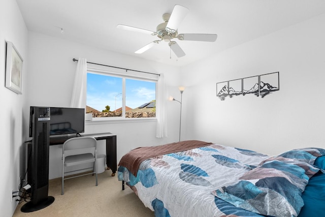 carpeted bedroom with a ceiling fan