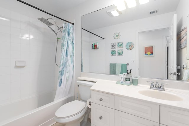 bathroom with toilet, shower / tub combo, vanity, and visible vents