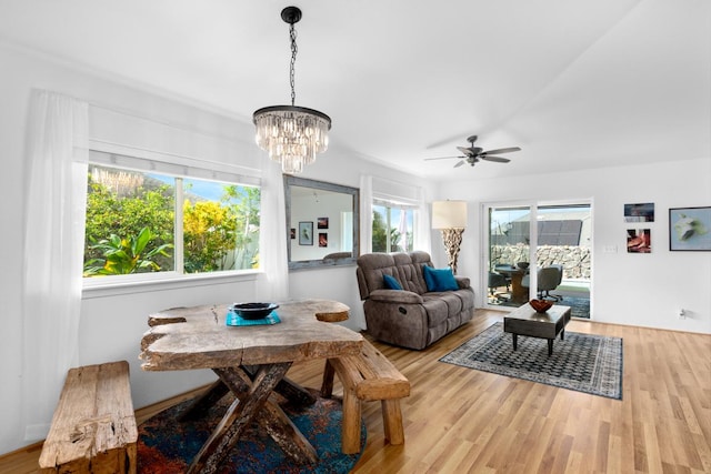 interior space featuring a notable chandelier and wood finished floors