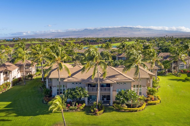 drone / aerial view featuring a residential view and a mountain view