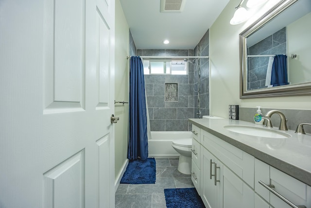 full bathroom with visible vents, shower / bathtub combination with curtain, vanity, and toilet