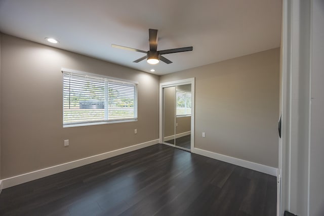 unfurnished room featuring ceiling fan, baseboards, dark wood-type flooring, and recessed lighting