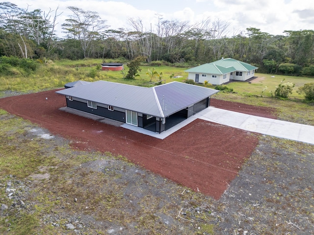 bird's eye view featuring a forest view