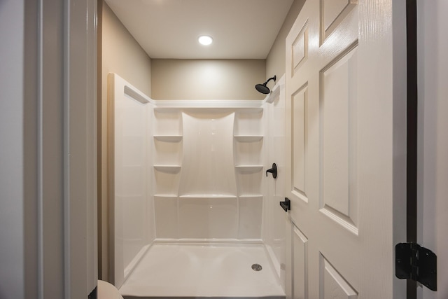 bathroom featuring a stall shower