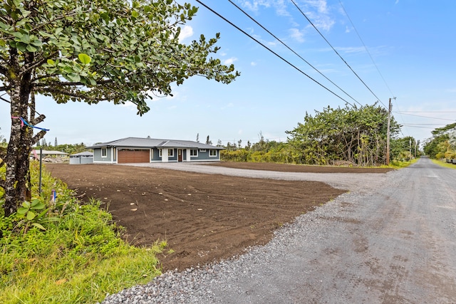 view of front of house featuring an attached garage and driveway