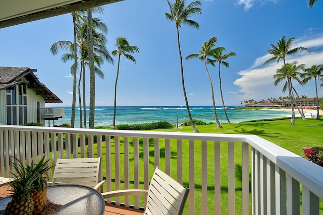 balcony featuring a water view