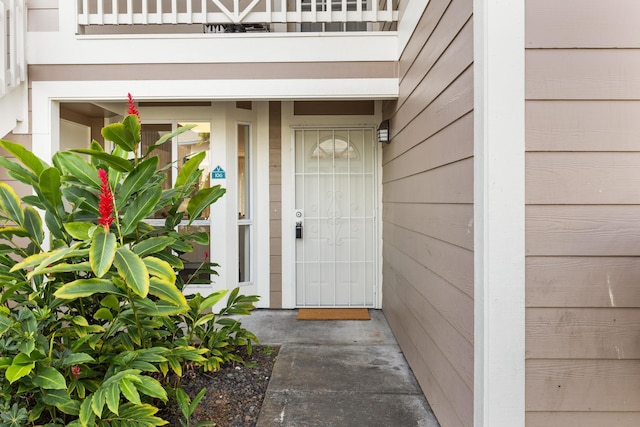 doorway to property featuring a balcony