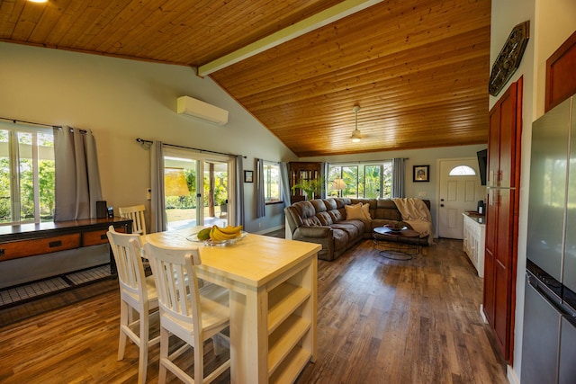 interior space with a wall mounted AC, wooden ceiling, dark wood finished floors, and a wealth of natural light