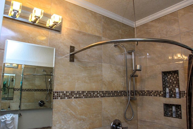 full bathroom with a textured ceiling, ornamental molding, and washtub / shower combination