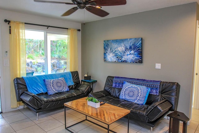 tiled living room with ceiling fan