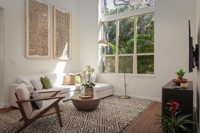 sitting room featuring wood finished floors and baseboards