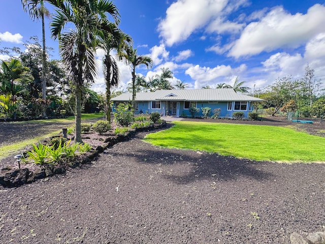 ranch-style house featuring a front lawn