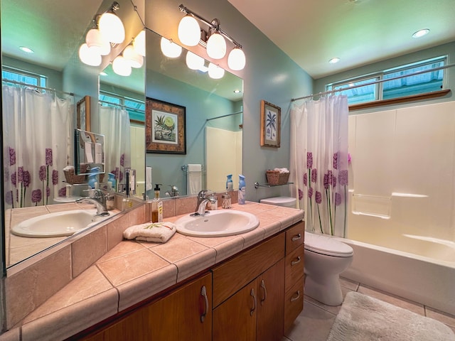 full bath with shower / tub combo with curtain, recessed lighting, toilet, vanity, and tile patterned flooring