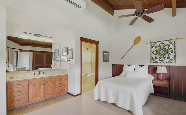 bedroom with wooden ceiling, light carpet, beamed ceiling, and ensuite bathroom