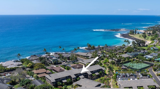 birds eye view of property with a residential view and a water view