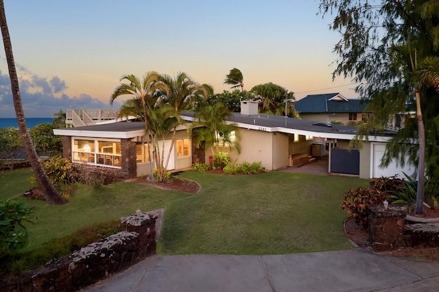 exterior space featuring a lawn and stucco siding