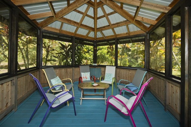 sunroom / solarium with vaulted ceiling