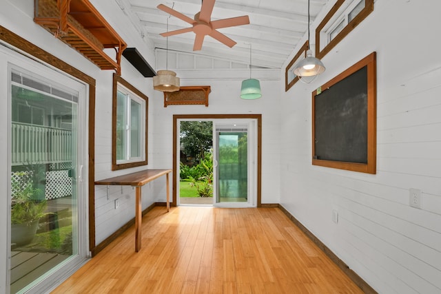 6450 Olohena Rd, Kapaa, HI 96746 - entryway featuring light wood-type flooring, ceiling fan, and wood walls