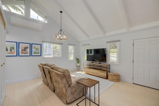 living area with baseboards, beamed ceiling, a wall mounted AC, and light wood-style floors