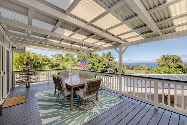 deck with outdoor dining area