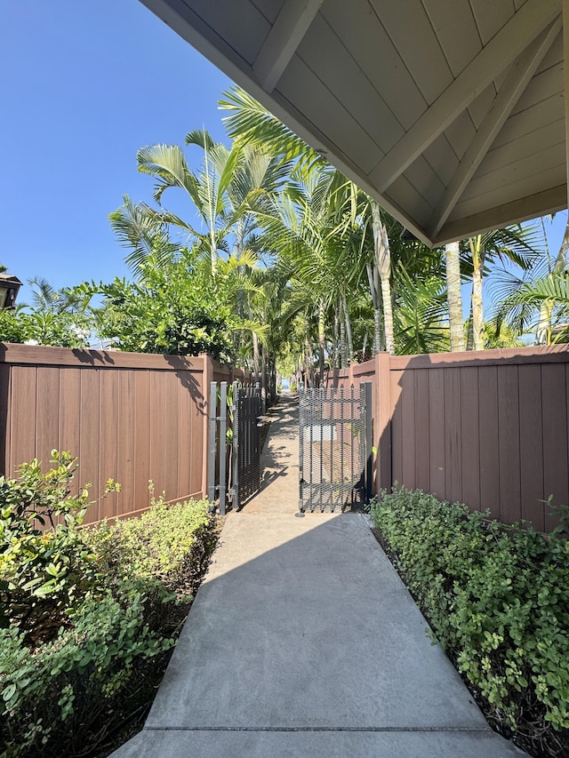 view of gate featuring fence