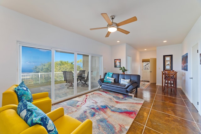 living room with tile patterned flooring, baseboards, a ceiling fan, and recessed lighting