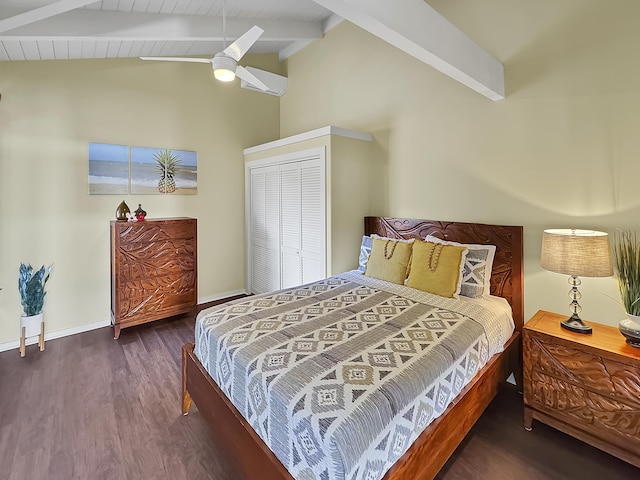 bedroom featuring lofted ceiling with beams, baseboards, wood finished floors, and a ceiling fan