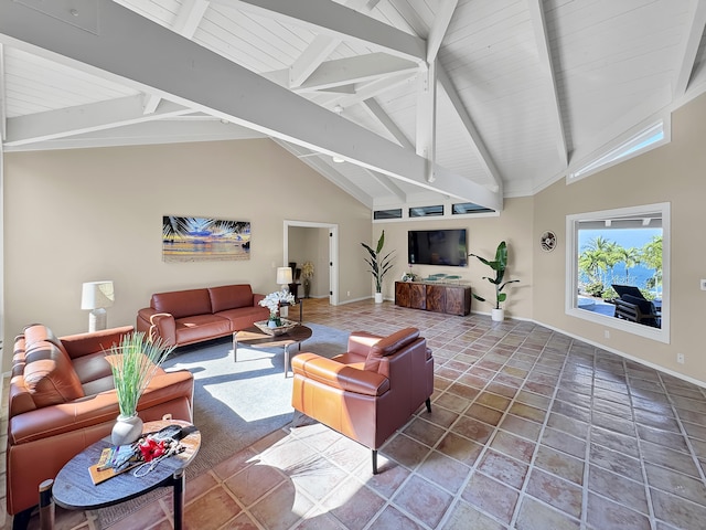 living room featuring baseboards, beam ceiling, and high vaulted ceiling