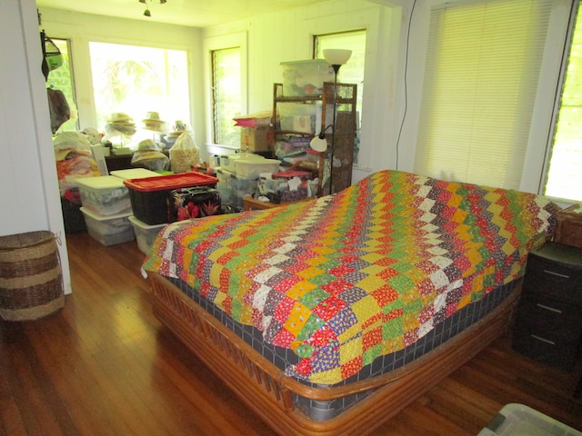 bedroom featuring wood finished floors