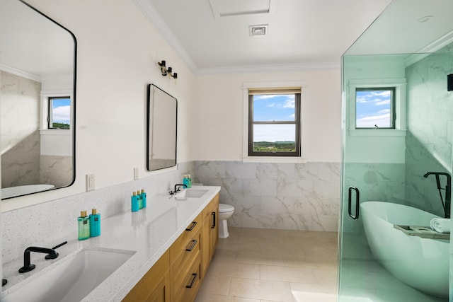 full bathroom featuring a healthy amount of sunlight, tile walls, a sink, and ornamental molding