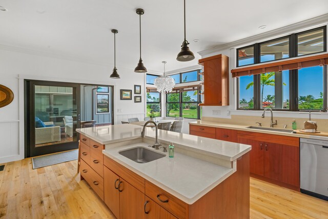 kitchen with light wood-type flooring, dishwasher, light countertops, and a sink