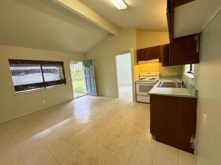 kitchen with white electric range oven, lofted ceiling with beams, open floor plan, light countertops, and a sink