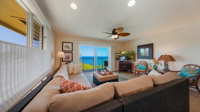 living area featuring ceiling fan and recessed lighting